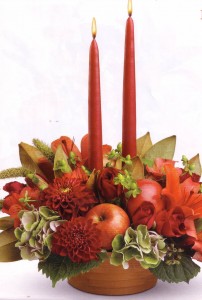 redcandleswithflowerarrangement